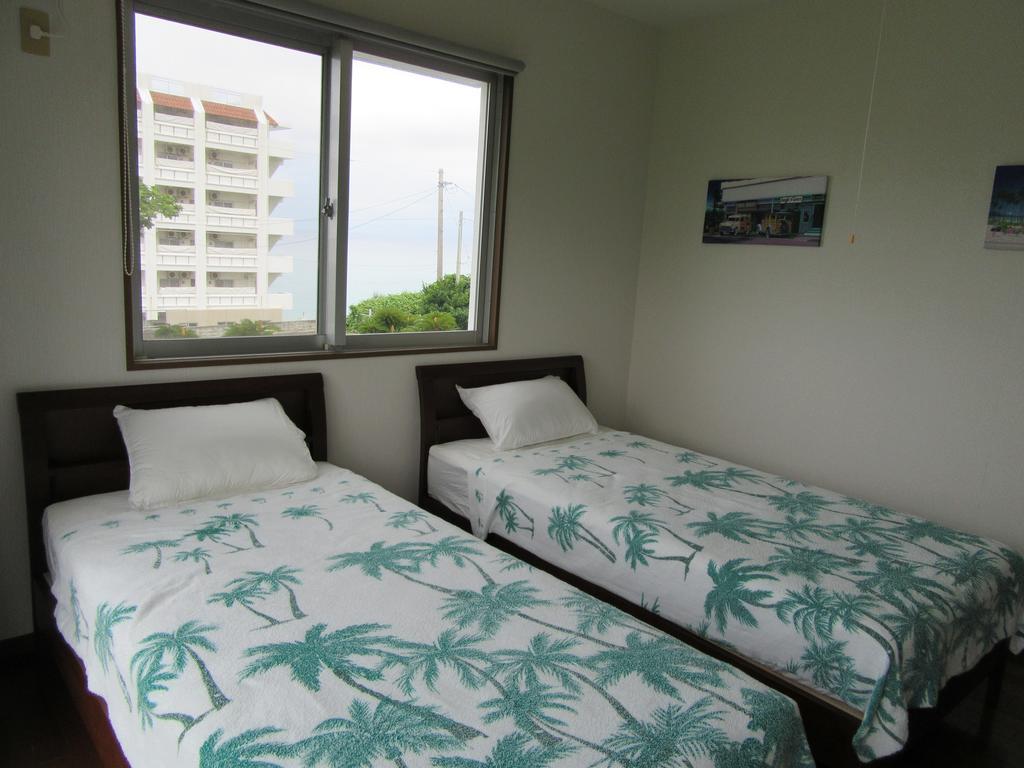 Guest House Diamond Yomitan Esterno foto